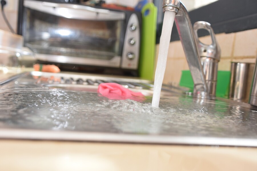 Sink overflowing due to clogged drain ... call LYF Services for drain cleaning.